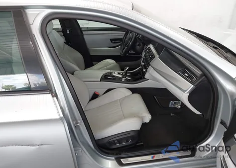 2014 BMW M5 z USA, uszkodzony, nr VIN WBSFV9C57ED097794